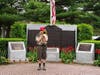 Boy Scout Augustin Mingioia Murphy plays Taps.