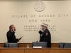 Mayor Cosmo Veneziale administers the oath of office to Chief Devyn Moody during a brief ceremony at Village Hall on Thursday, April 22, 2021.