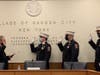 Mayor Cosmo Veneziale administers the oaths of office to 1st Assistant Chief Matthew Pearn, 2nd Assistant Chief James Taunton and 3rd Assistant Chief Jonathan Parrella during a brief ceremony at Village Hall on Thursday, April 22, 2021.