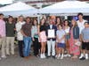Famed jockey Javier Castellano with his wife, Abby, their three children and extended family. Mayor Mary Carter Flanagan presented him with a citation during a ceremony at the Belmont Festival on Seventh Street June 9, the eve of the Belmont Stakes.