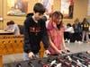 Two students play foosball during a recent Friday Night event at The Bridge Teen Center.