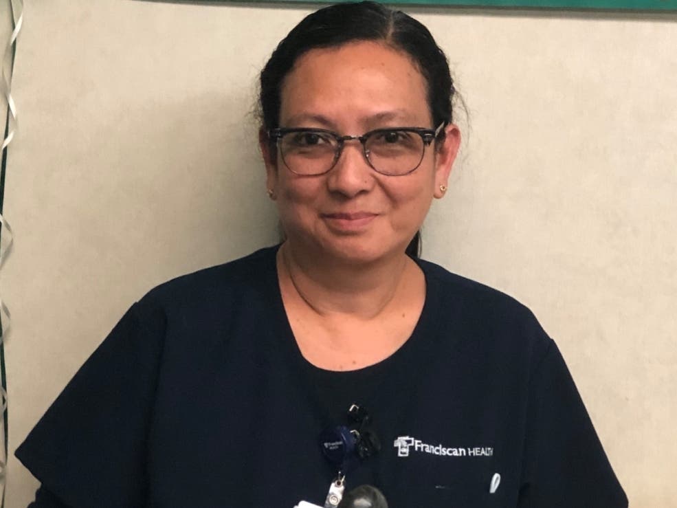 Steger resident, Josie Gallardo, RN, at Franciscan Health Olympia Fields accepts Daisy Award, honoring exceptional nurses.