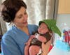 The Brassea family’s newborn baby boy with Franciscan Health nurse Nora Savaglio.