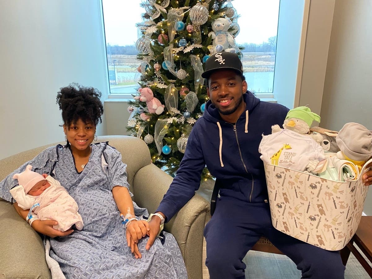 Baby Nava, the first child born at the Franciscan Health Olympia Fields Family Birth Center in 2022, with mom Terranisha Cromwell and dad J. Lamb.