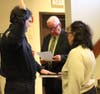 Plymouth Township Council Chair Marty Higgins swears in fire marshal Michael Matusheski. 