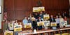 Plymouth Township Council stands with supporters of an effort calling for municipalities to commit to clean energy use.