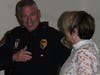 Plymouth Township Police Chief John Myrsiades shows off his new badge. 