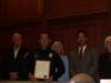 Plymouth Township Police Chief John Myrsiades, along with the Plymouth Township Council recognize Michael Watts as Police Officer of the Year.