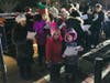 Children sing during Plymouth Township's holiday tree lighting.