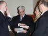 Plymouth Township police officer George Cornick is sworn in during Monday's council meeting.
