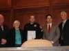 The Plymouth Township Council congratulates police officer Robert Heger for 20 years of service. 