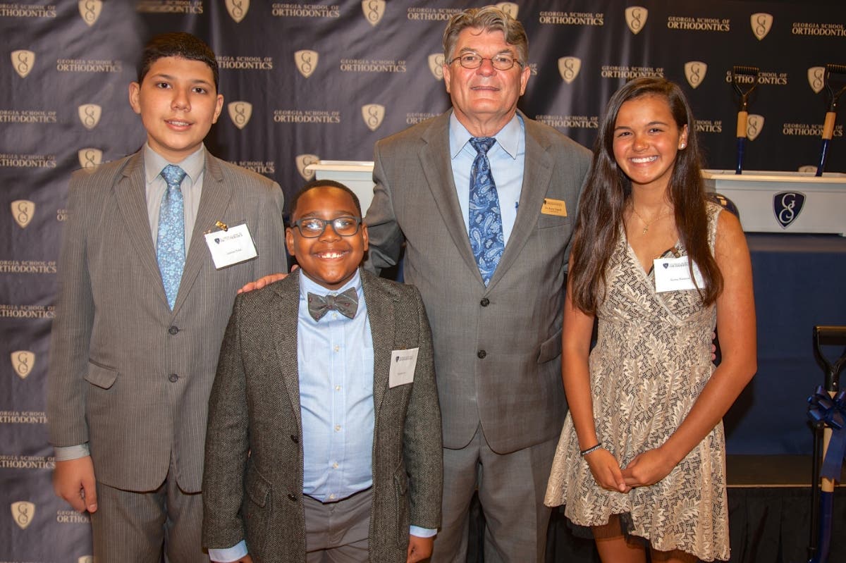 Recipients of GSO's Gift of a Smile include Damian Soler, Lawrenceville, GA; Savien Cox, Decatur, GA; Dr. Ricky E. Harre