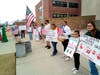 Students, children and adults gathered in front of the Blount County Courthouse