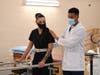 Jordon Womack and fellow PTA student, Ivana Mosely, receive hands-on training in therapies intended to help patients improve mobility, relieve pain, and prevent or limit permanent physical disability.
