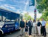 New Jersey state officials, Chamber of Commerce, SJTA and RCSJ representatives pose at an RCSJ–Cumberland bus stop next to a SJ Connects shuttle.
