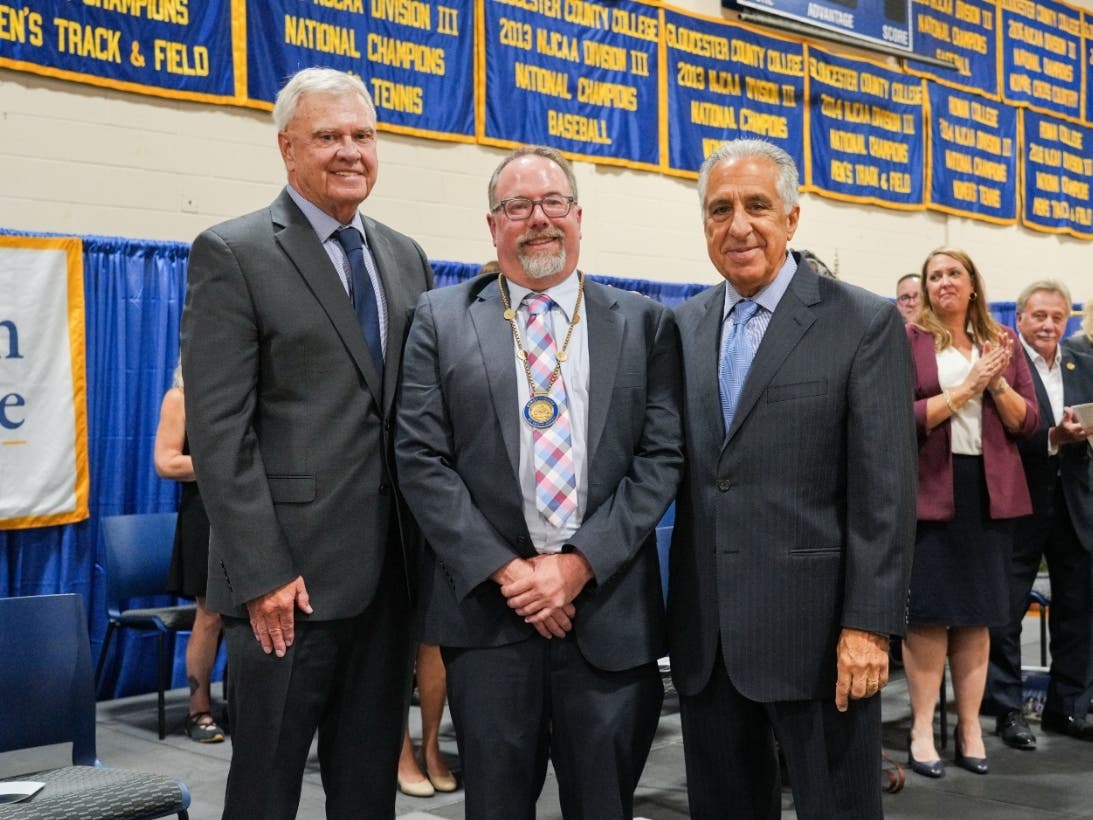Dr. Brenden Rickards, the second president of Rowan College of South Jersey, poses with former President Dr. Fred Keating (L) and RCSJ Board of Trustee President Gene Concordia, at Rickards' inaugurations ceremony.