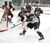 North Haven #14 Thomas Guidone has a chance against Sheehan goaltender.