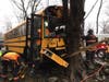 A school bus driver was hospitalized after crashing into a tree Friday morning in Westport.