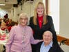 West Haven Mayor Nancy R. Rossi, center, joins Dorothy and William McCarthy during the city’s 30th annual Valentine’s Day party.