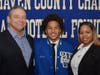 West Haven's Jordan Berrios with mother Tonisha and coach Rich Boshea.