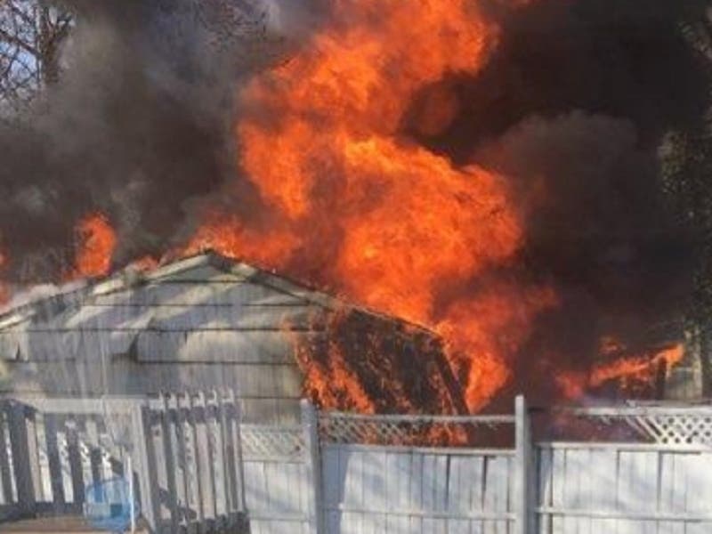 A fire destroyed a garage and a vehicle Sunday in Connecticut.