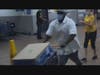 A surveillance image of a man accused of shoplifting trying to leave Walmart in Naugatuck on Friday night.