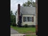 Crews at the scene of a house fire on Mott Street in Hamden on Thursday.