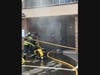 Crews battle a garage fire at the Broadmoor Apartments on Mix Avenue on Wednesday afternoon in Hamden.