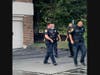 Four police officers were treated for smoke inhalation after helping rescue residents from a two-alarm fire at the Broadmoor Apartments on Wednesday afternoon in Hamden.