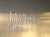 Police released images of graffiti that was found inside a business after a burglary Monday morning in Naugatuck.