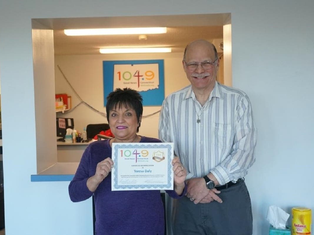 Teresa Daly, left, and WIHS 104.9 FM General Manager Steve Tuzeneu.