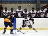 North Haven's Aaron Racino looks to take the puck.