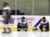 North Haven's Nick Howlett (#19) and Michael Anguillare (#8) loosen-up before the start of the third period.