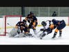 North Haven's Will Fiore attacks the net.