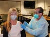 Mayor Nancy R. Rossi receives her first dose of the COVID-19 vaccine from West Haven Fire Department Chief James P. O’Brien at City Hall on Wednesday.