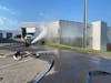 Crews work to extinguish a fire at Bic Drive in Milford on Monday morning.
