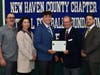Sheehan’s Jason Villano with parents Edward and Colleen, scholar athlete chairman Kevin O'Brien and coach John Ferrazzi.