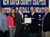 Notre Dame-West Haven’s Aiden Stankiewicz, from North Branford, with parents Christopher and Deborah, scholar athlete chairman Kevin O'Brien and coach Joe DeCaprio.