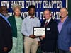 West Haven’s Malachi Wright with cousins Jonathan and Sablina Davis, scholar athlete chairman Kevin O'Brien and coach Rich Boshea.