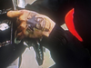 A surveillance image of the robber's hand.