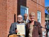 Phil Liscio is presented with a citation from Mayor Nancy R. Rossi for “the immeasurable contributions you have made to the civic and cultural life of West Haven” as Executive Assistant Louis P. Esposito Jr. looks on. 