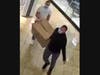 The men were seen leaving the mall with a box of $3,700 worth of clothes, according to police.