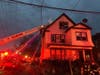 Crews extinguished a two-alarm fire Thursday morning in Hamden.