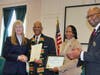 West Haven African American Citizen of the Year the Rev. E. Carl Howard, 2nd from left, is joined by his wife, Belinda Howard, 3rd from left, as he receives citations from Mayor Nancy Rossi and West Haven Black Heritage Committee Chairman Steven Mullins.