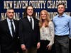 Notre Dame-West Haven's Justin Simoncek, of Milford, with parents Trista and Joseph and coach Joe DeCaprio.