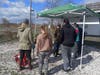 Volunteers receive instructions prior to Sandy Point Beach Cleanup.