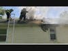 Crews battle an attic fire on Colonial Drive in Hamden on Wednesday afternoon.