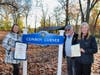West Haven state Rep. Dorinda Borer, left, and Mayor Nancy R. Rossi present citations to Tom Conroy, a former program coordinator at the city Department of Parks and Recreation, dedicating the Painter Park pavilion as “Conroy Corner” on Monday.