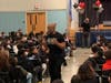 Darryl "DMC" McDaniels speaks to eighth-grade students in the Bailey Middle School auditorium on Tuesday.