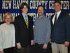Hamden's Daniel Landberg with (from left to right) mother Tammy, father John and coach Tom Dyer.